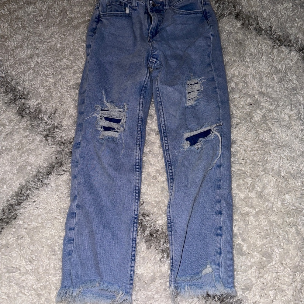 Distressed Blue Denim Jeans